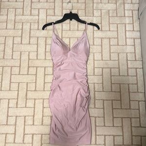 Cute pastel pinkish purple dress. New, no tags.